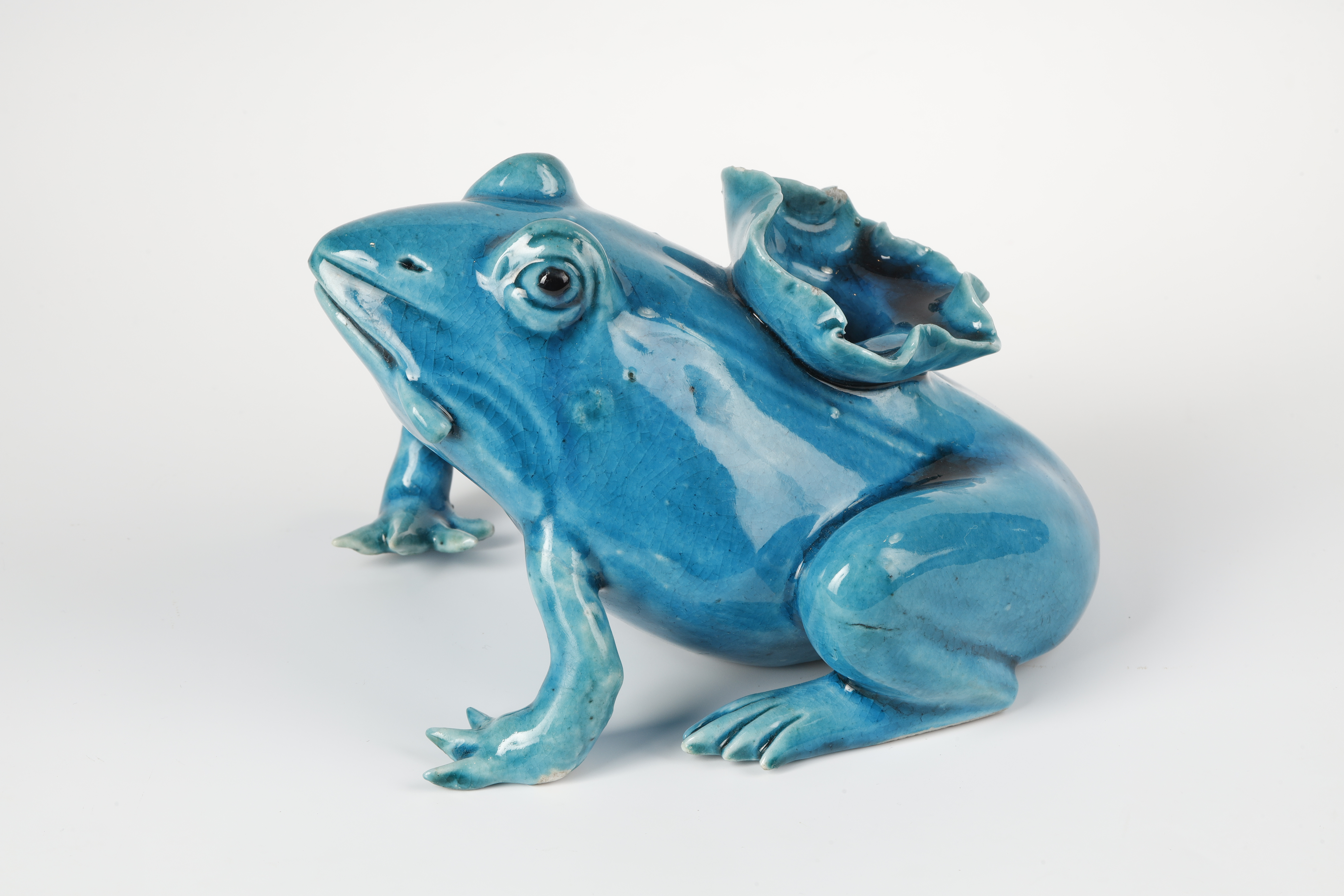Frog in "turquoise blue" biscuit with a lotus on the back . 
China 18th or early 19th century